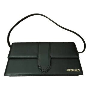 I sell a beautiful black Jacquemus Le Grand Chiquito bag with gold logo on the s